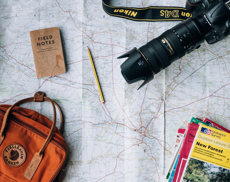 Traveler planning a trip abroad with map and passport